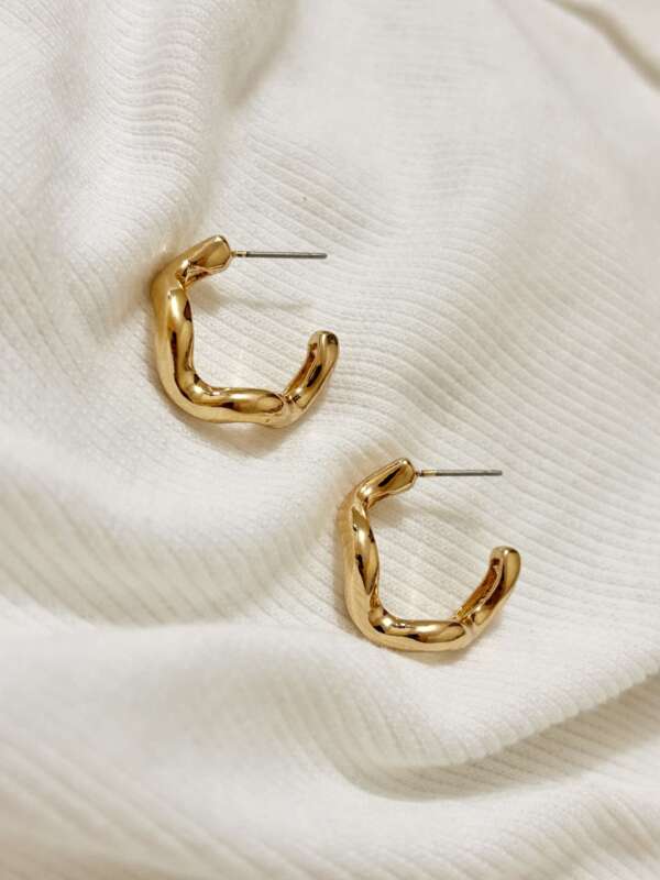 Gold wavy hoops