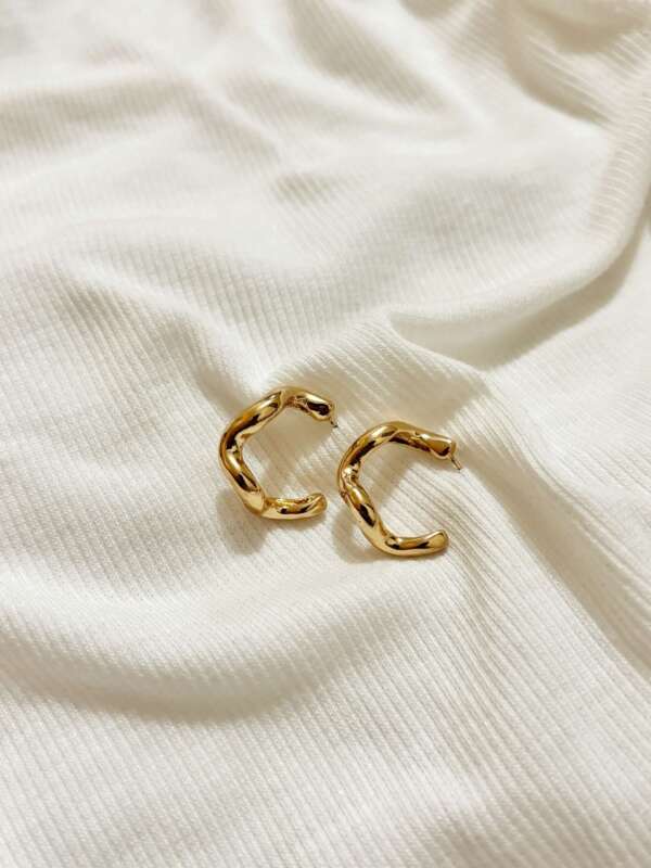 Gold wavy hoops